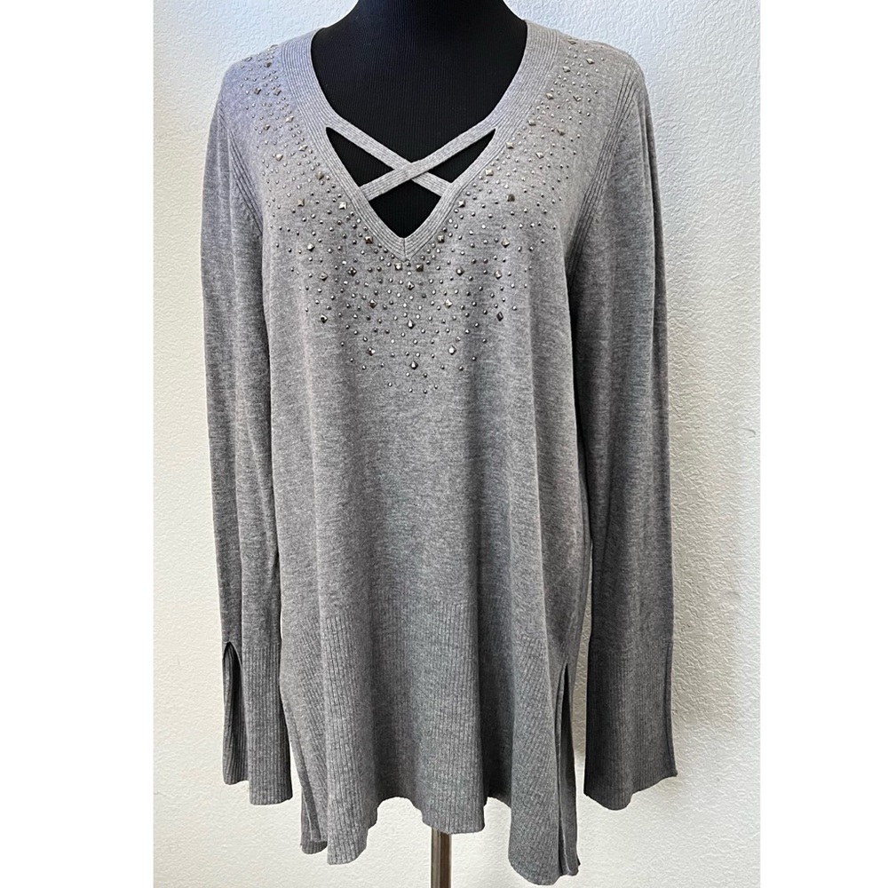 Slouchy long sweater with criss-cross neckline